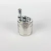 Crusher Mill Champ Mini 40mm – compact silver metal grinder with crank handle, designed for smooth herb grinding and easy use.